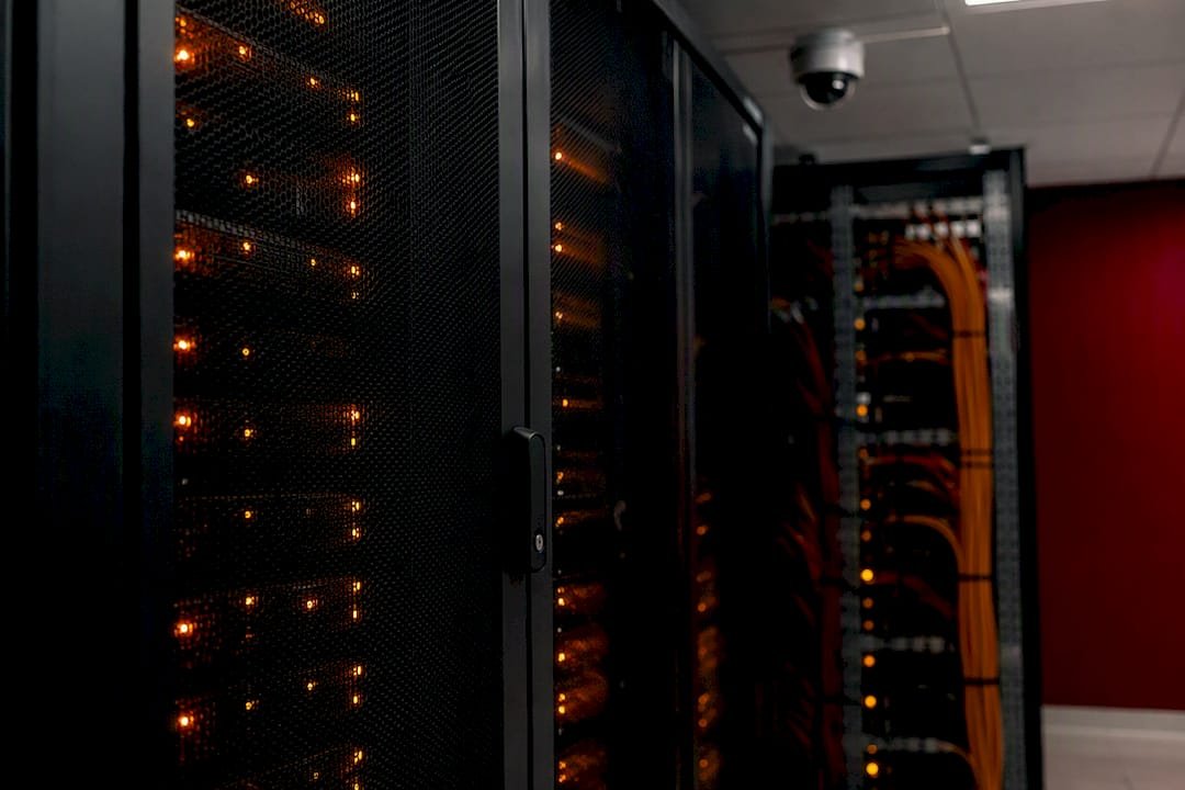 Locked server rack with security lights in small business