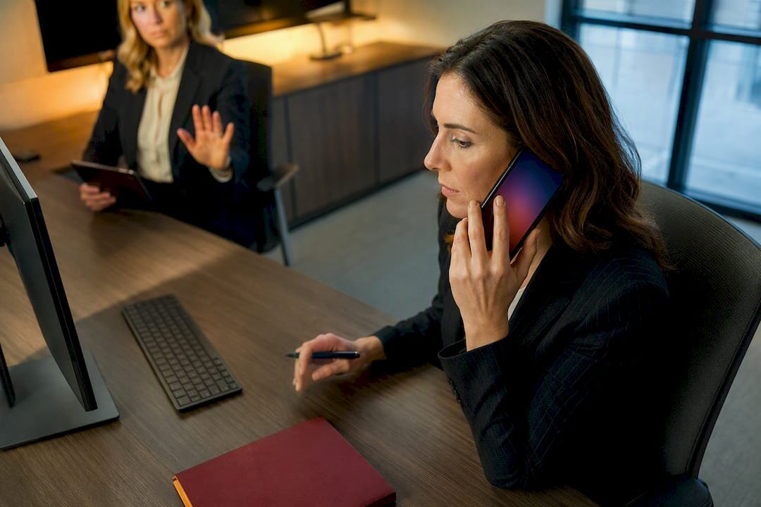 Finance team verifying payroll change by phone