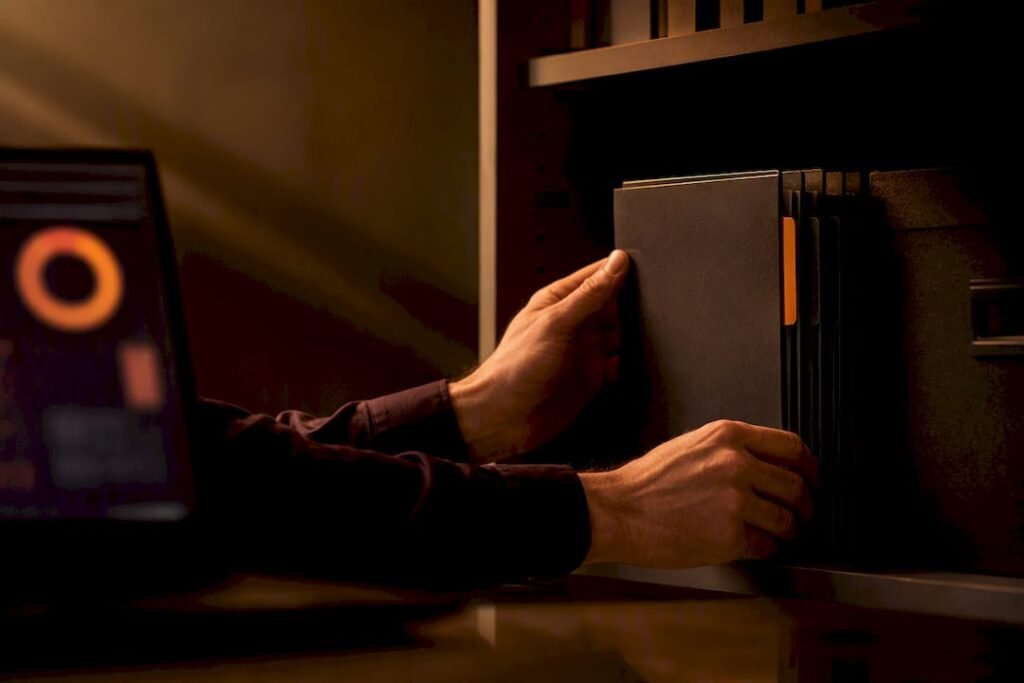 Analyst organizing cybersecurity compliance evidence