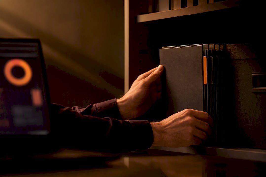 Analyst organizing cybersecurity compliance evidence