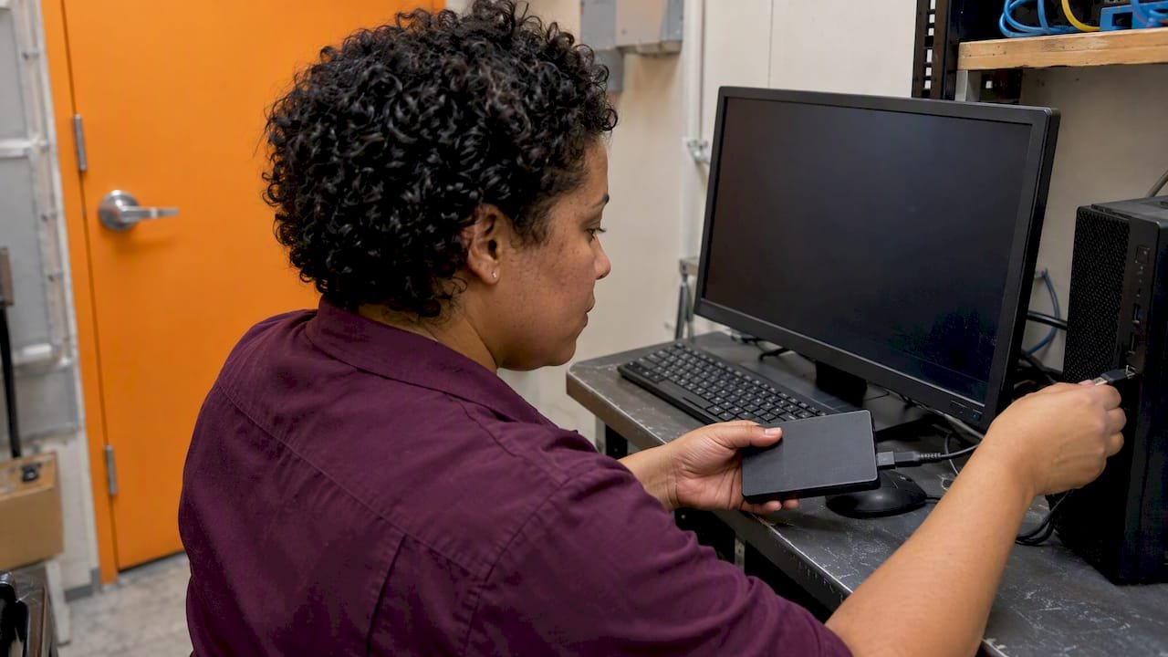 Technician testing a small business backup